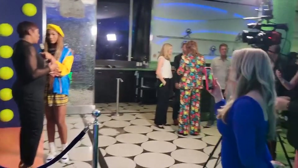 Costumed performers entertaining guests at a themed corporate event